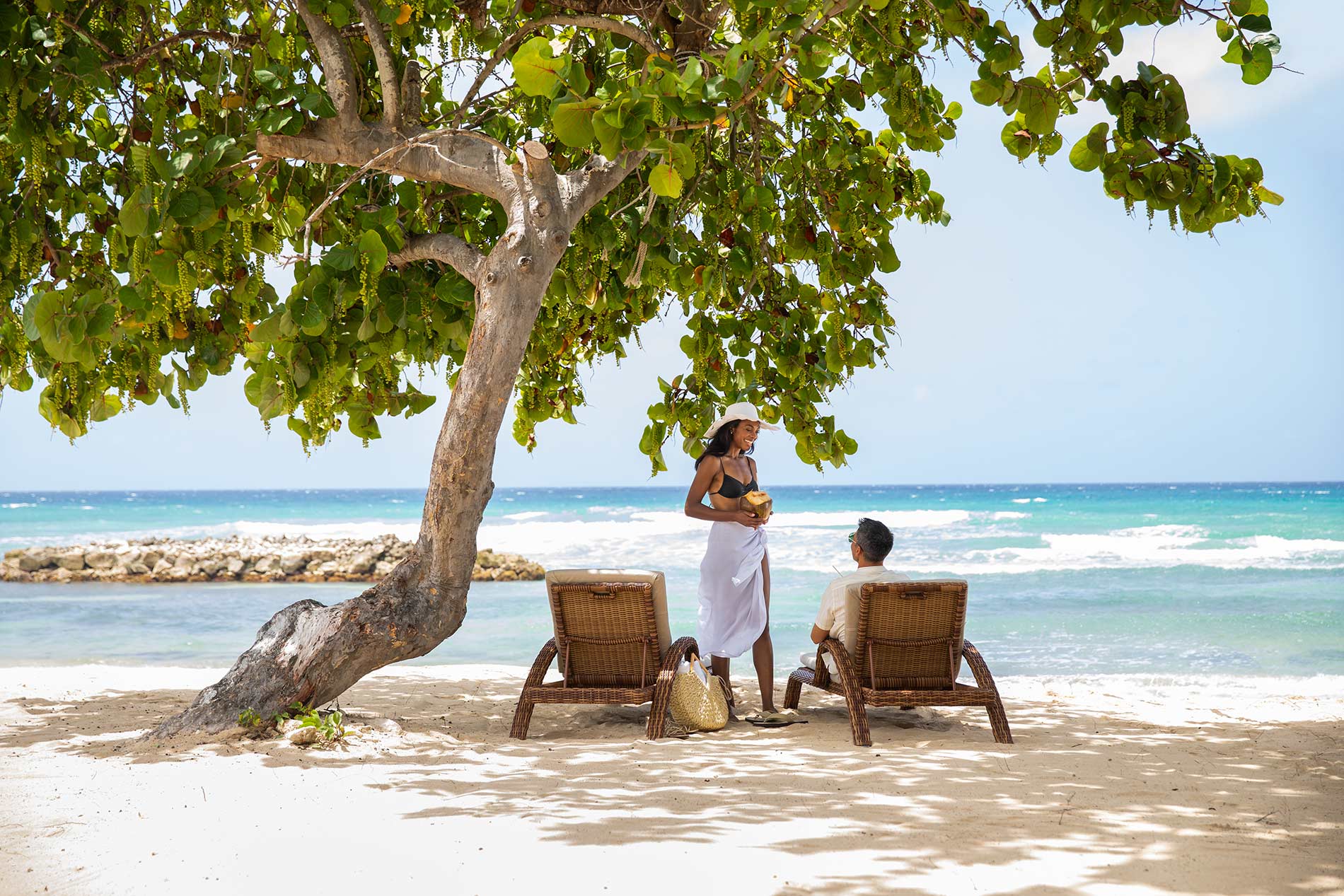 Hyatt Zilara Rose Hall beach loungers couple.