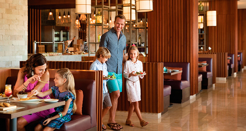 Family dining together at Hyatt Ziva Cancun