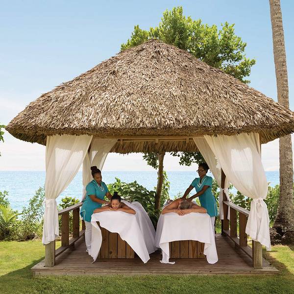 Massage at seaside palapas.