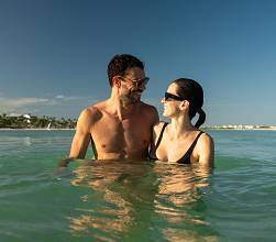 Hyatt couple at the ocean.