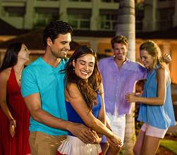 Hyatt Ziva Rose Hall friends dancing.