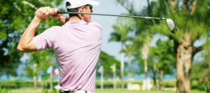 A man playing golf.